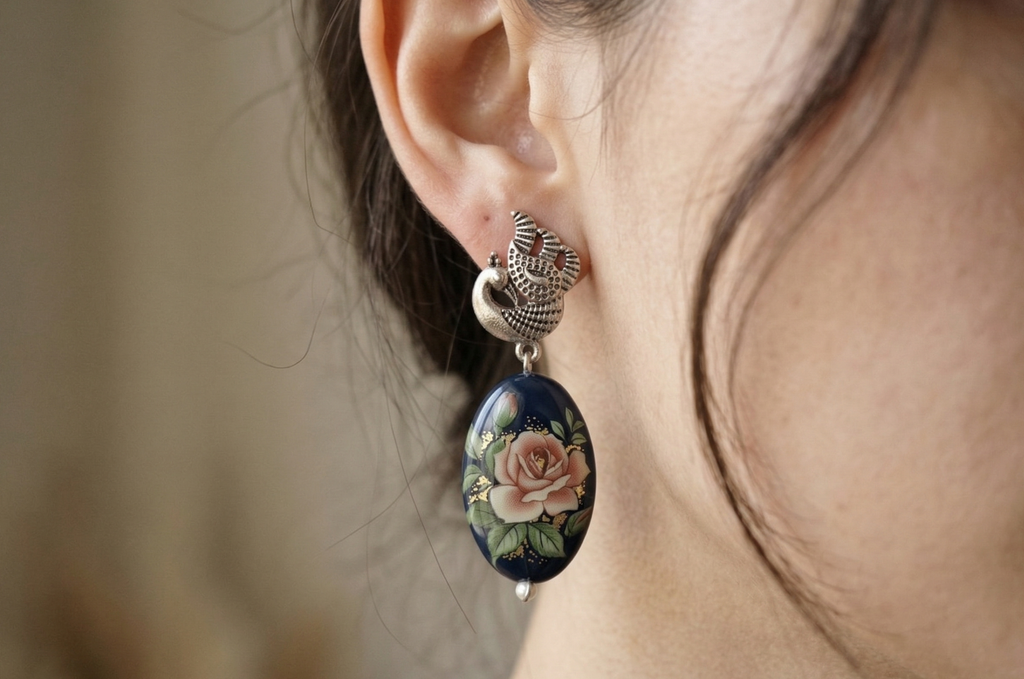 Orecchini in stile vintage con pavone